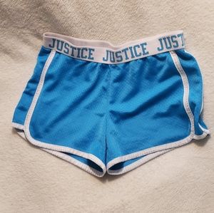 This is a kid's size 12 blue Justice shorts